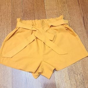 High waisted yellow mustard shorts. Size S